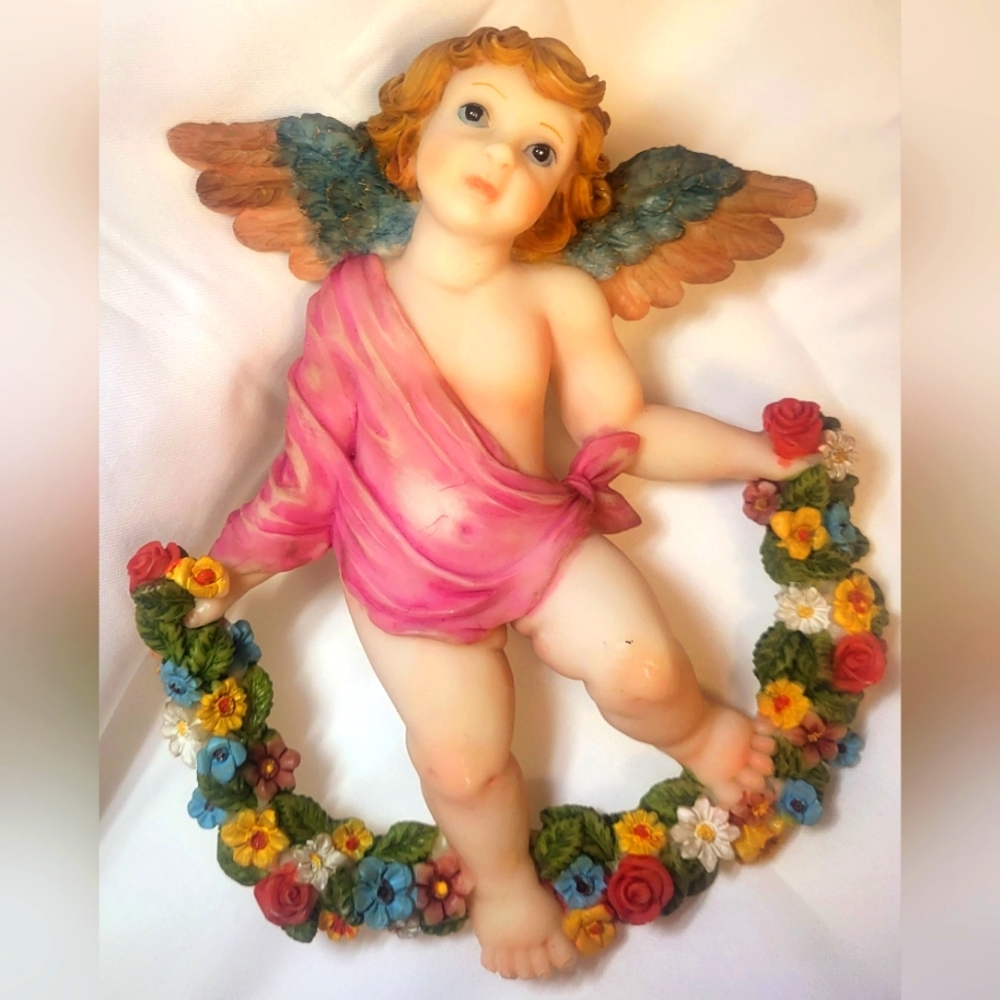 A set of two angel wall decoration